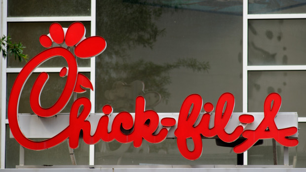 A Chick-fil-A sign is seen above one of