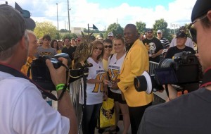 Owl mascot, Sturgis and AD, Vaughn Williams, greet the first fans into the stadium on Satuday