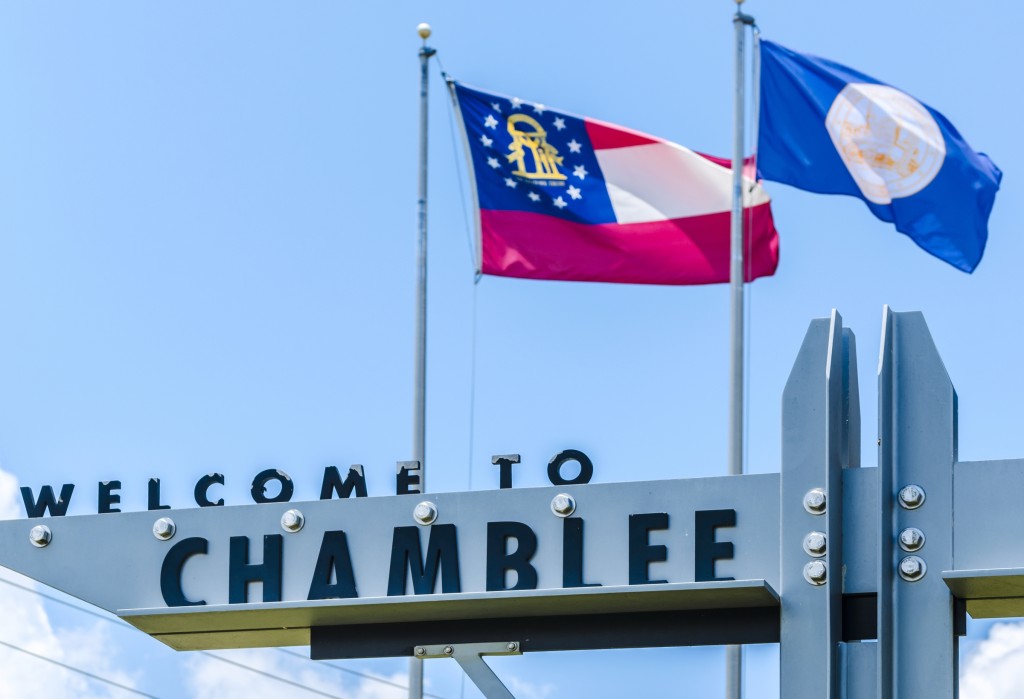 A welcome sign hangs outside Chamblee City Hall in Chamblee, Georgia, June 10, 2014. Chamblee was incorporated in 1907 and had a population of 9,892 people according to the 2010 U.S. Census. The city's motto is, "A City on the Right Track." (Photo by Carmen K. Sisson/Cloudybright)