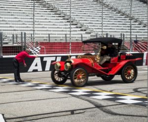 A car from 1909 runs a lap at Atlanta Motor Speedway
