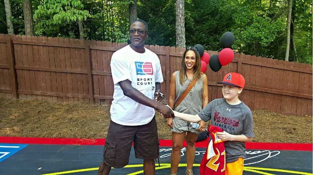 (from left to right) Dominique Wilkins, Sunny Wilkins, Evan Connelly