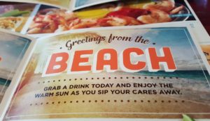 Hooters Summer Menu takes you to the beach