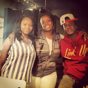 K Camp with Mama Camp (center)