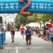 Runners crossing the finish line during Atlanta’s Big Peach Sizzler on Labor Day 2026.