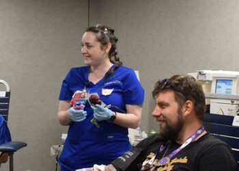 A Dragon Con attendee donating blood during the 2026 LifeSouth blood drive in Atlanta; Sam Sachs/WSB-TV photo.