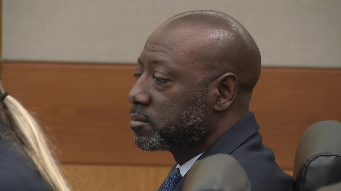 Former East Point police officer Richard Gooddine seated in a Fulton County courtroom during his 2026 retrial.