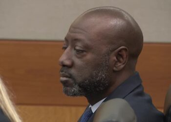 Former East Point police officer Richard Gooddine seated in a Fulton County courtroom during his 2026 retrial.