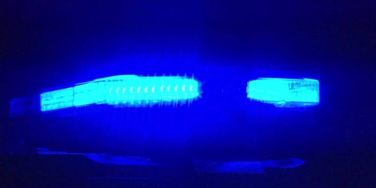Blue police lights illuminated at night