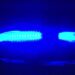 Blue police lights illuminated at night