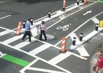 Atlanta Police Department surveillance footage showing a suspect confronting a woman near 10th and West Peachtree streets in Midtown Atlanta on Oct. 3, 2026.